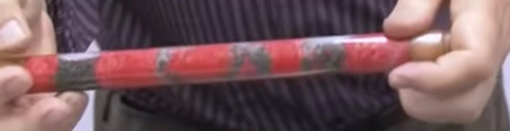 Tube of plastic and steel pellets