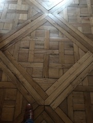 Wood floor with gaps and cracks