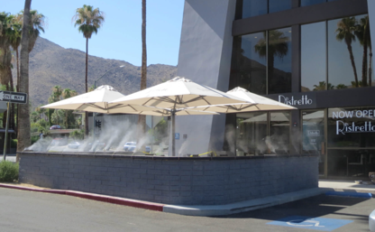 Outdoor restaurant cooling system sprays